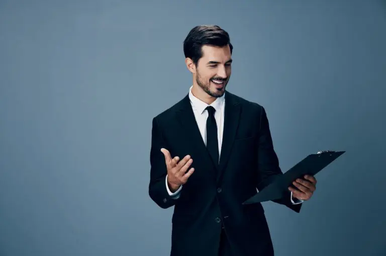 Business Owner looking at technology checklist