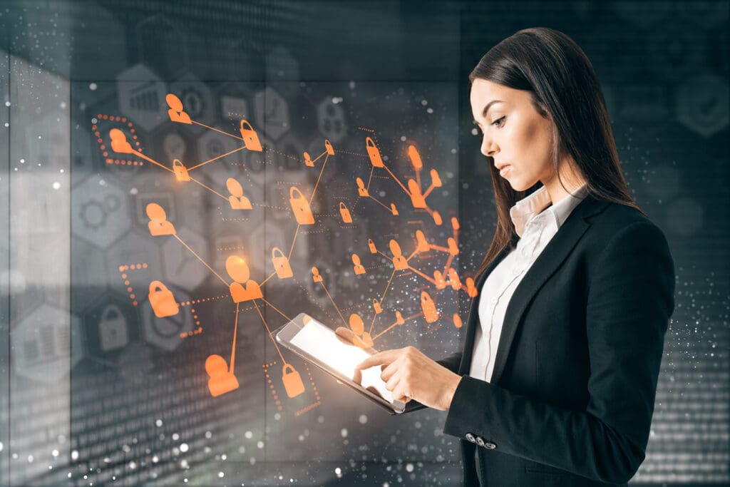 Business woman reviewing network activity with her managed firewall