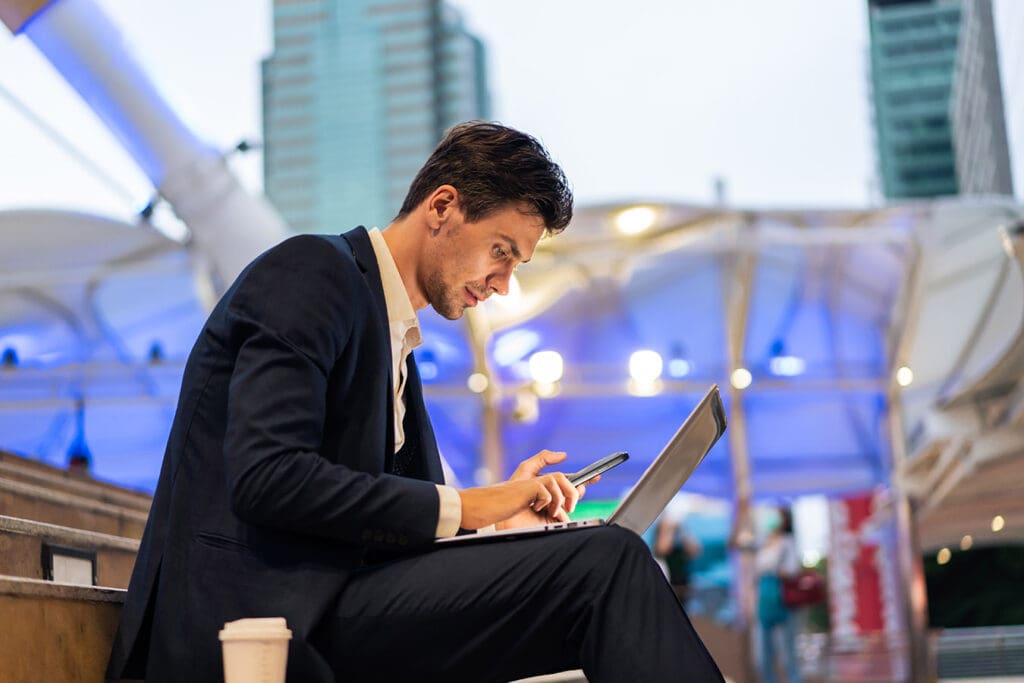 Businessman-working-on-public-wifi-during-conference