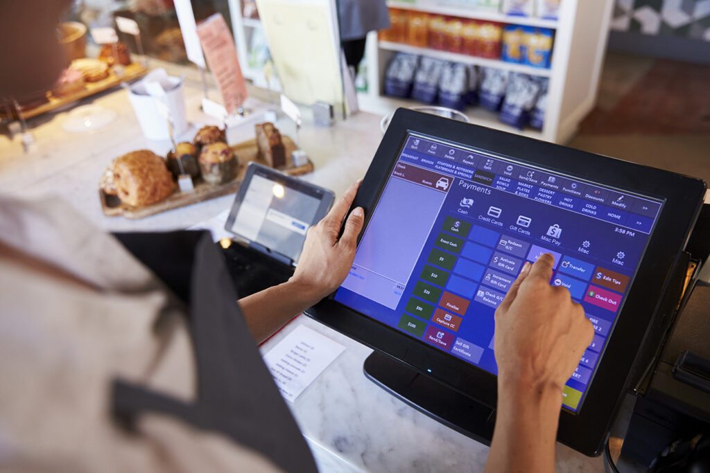 Cashier-using-a-Point-of-Sale-sysetm-tied-to-Wifi