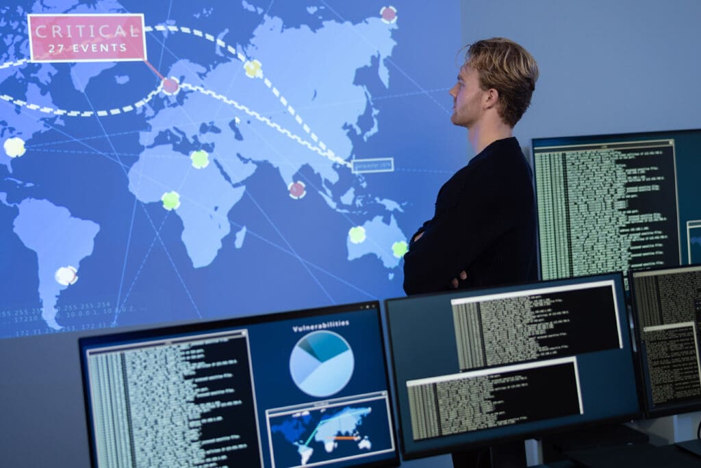 Cybersecurity-professional-reviewing-cyber-attacks-across-the-globe