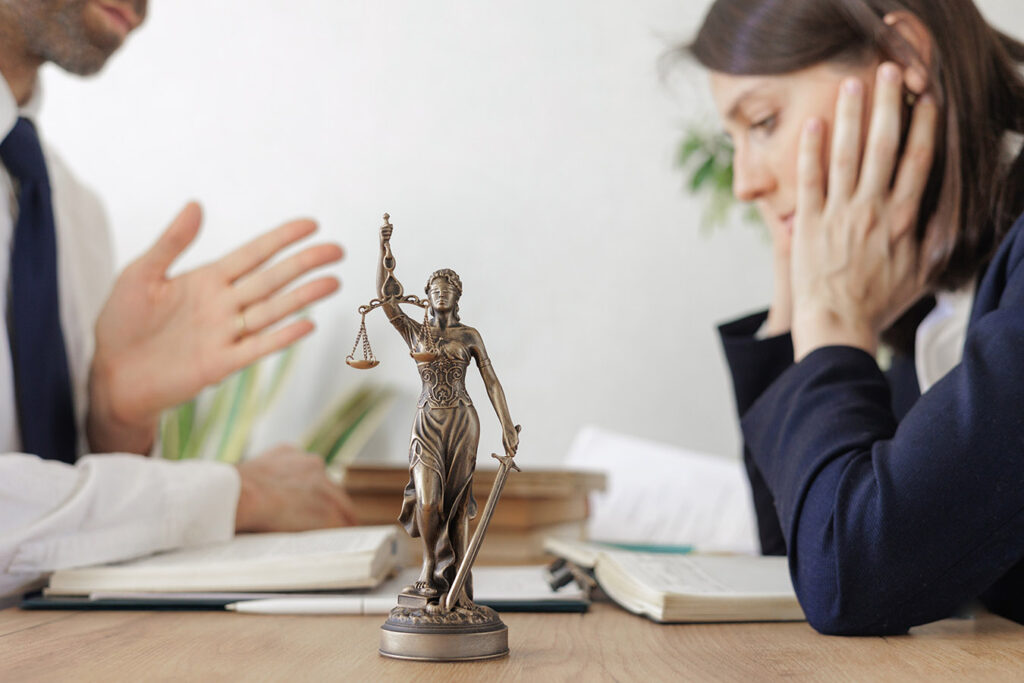 Lawyer going over legal proceedings and trouble with client