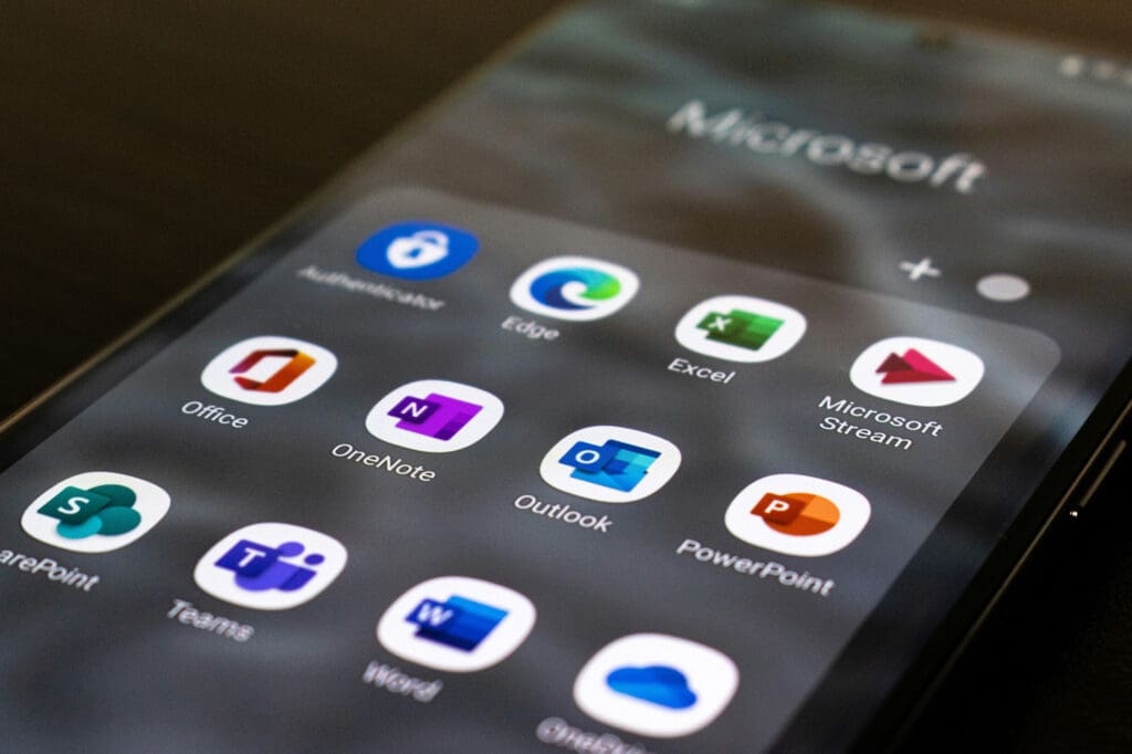 Microsoft 365 suite seen on moble device Photo by Ed Hardie on Unsplash