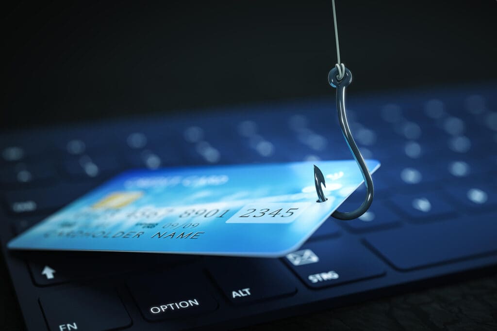 Phishing-Concept-image-of-fish-hook-pulling-in-a-credit-card