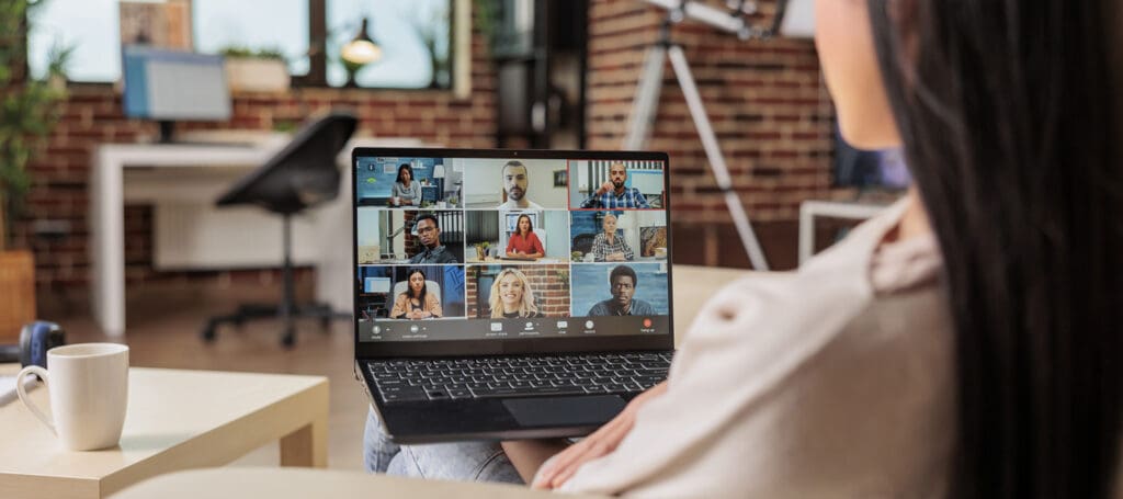 Woman-on-a-video-confernece-for-her-job-working-remotely