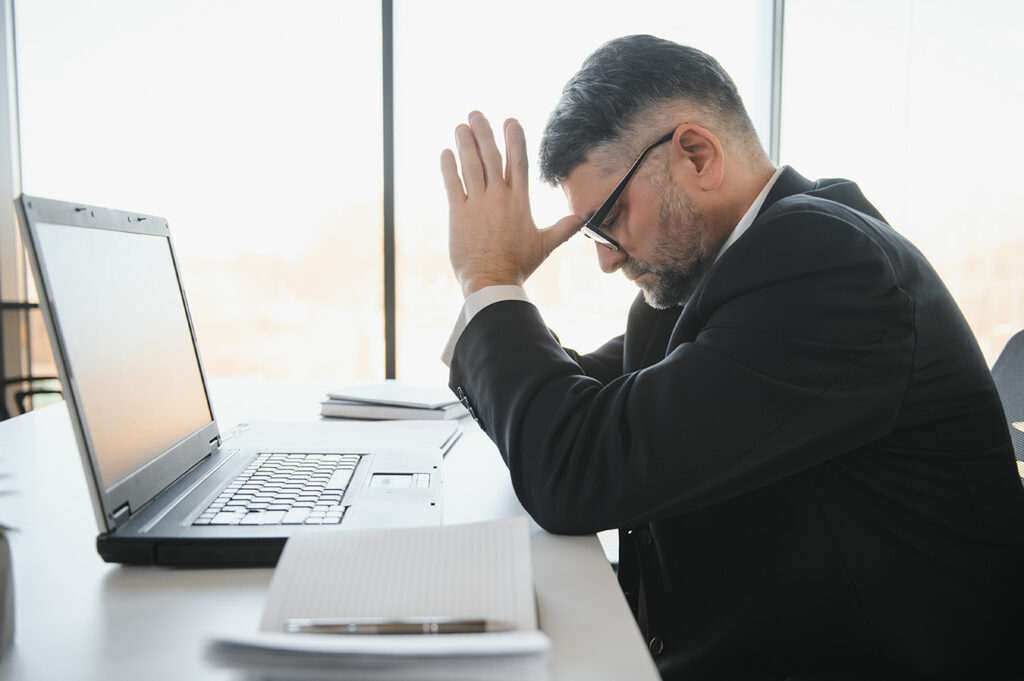 business man stuck waiting on wifi to connect